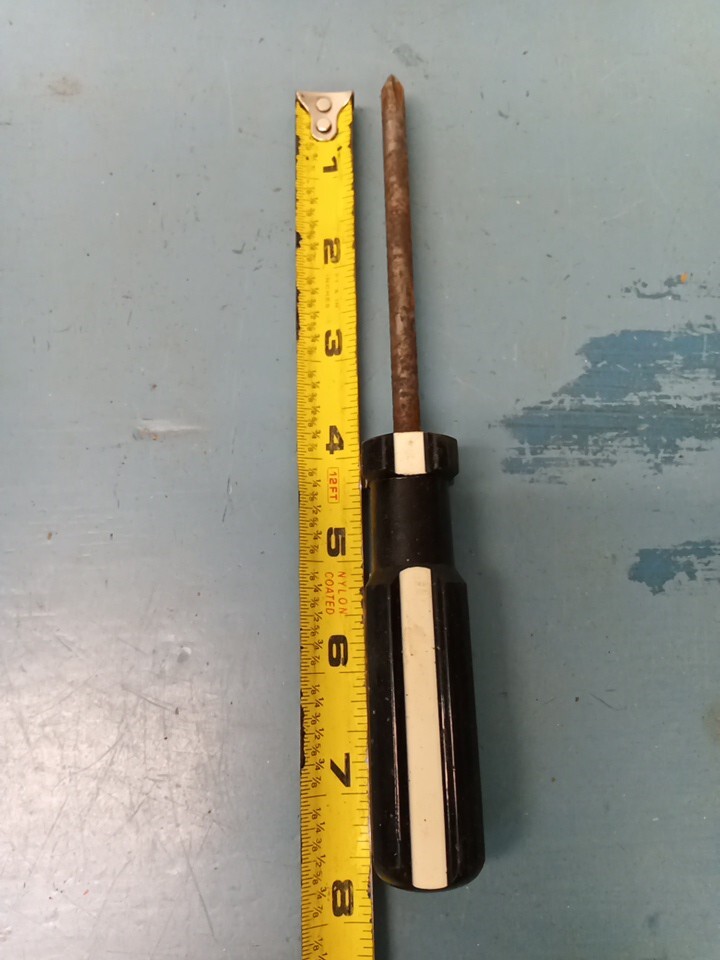 Black & White handle Phillips screwdriver. (LL)