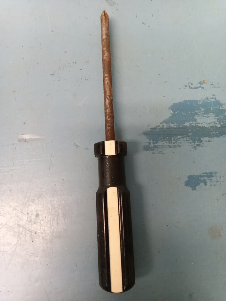 Black & White handle Phillips screwdriver. (LL)